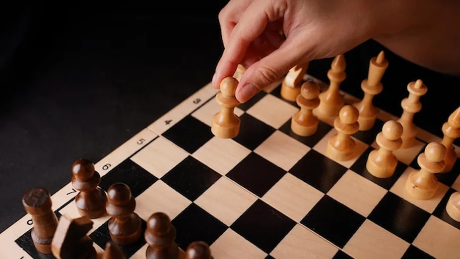 chess pieces strategy board closeup
